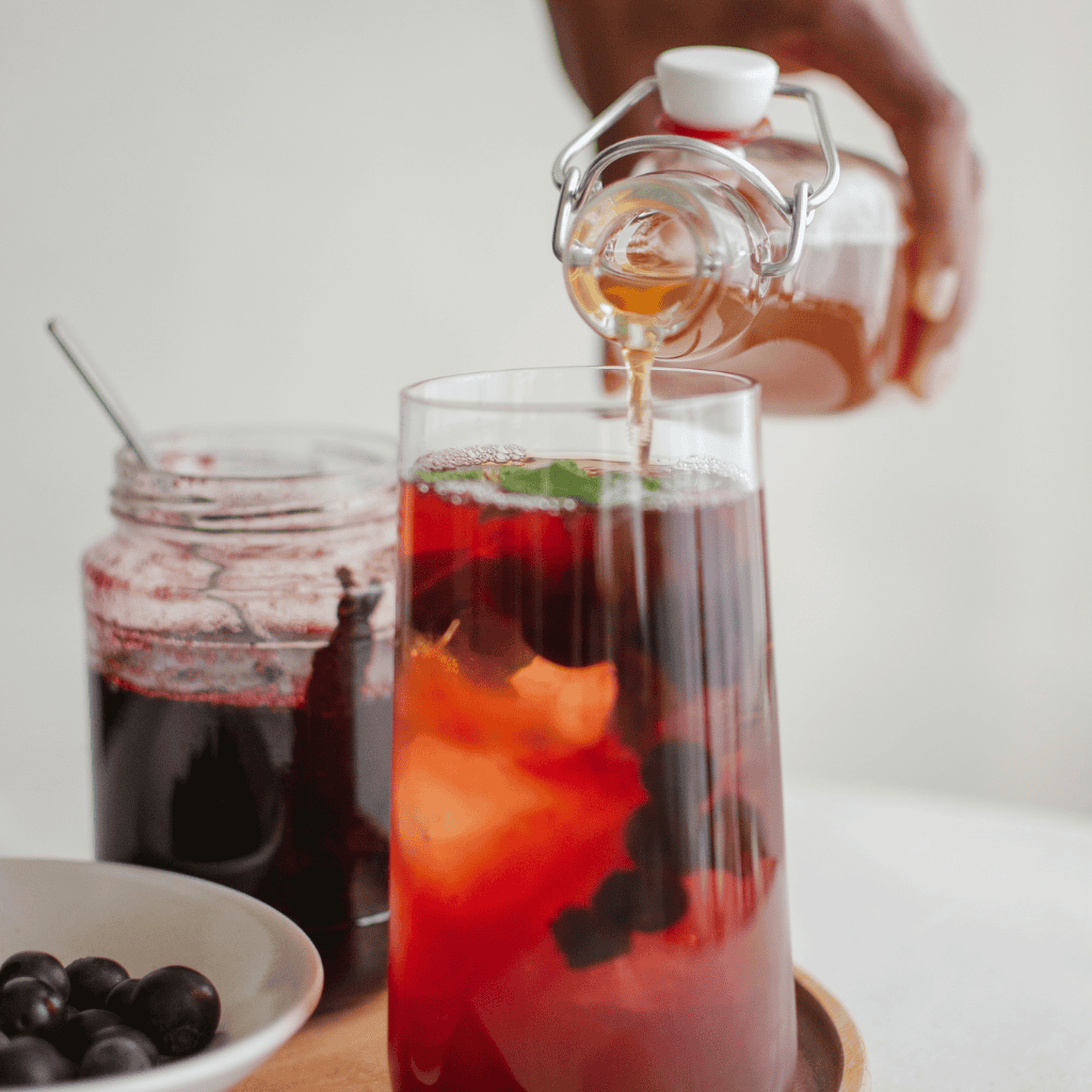 Woman making kombucha